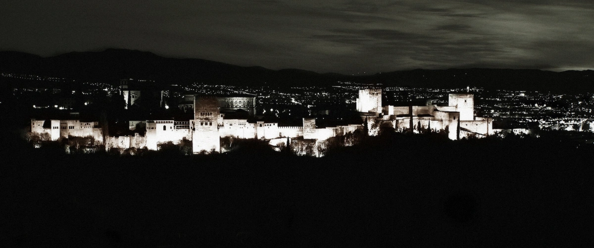 The Alhambra and the Sierra Nevada seen from the Mirador de San Nicolás, Granada, Spain